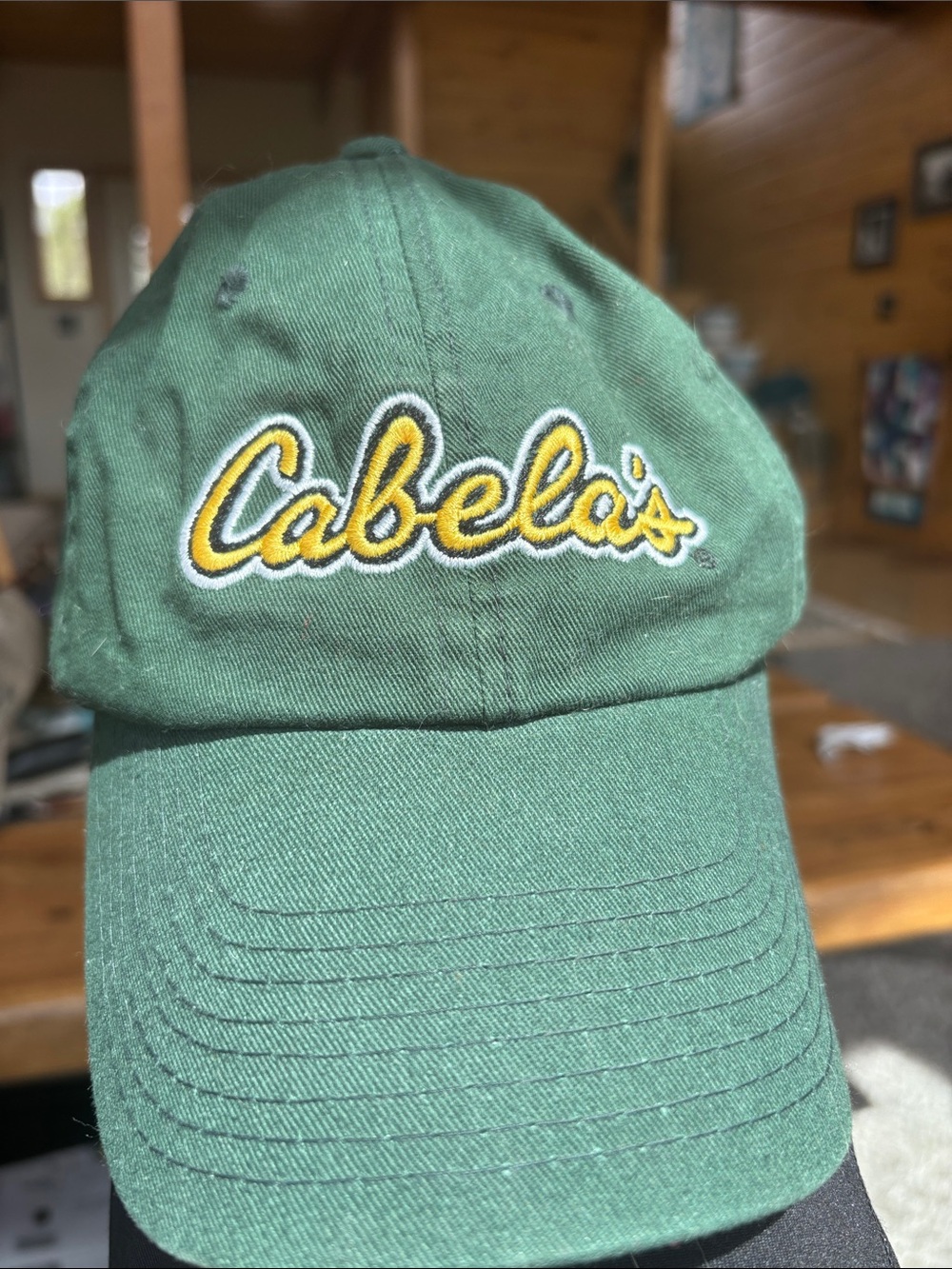 Cabela's Green Cap with Yellow Script Logo